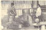 Blacksmith was Awka's main industry. Here, two blacksmiths work at Ojogwu Smithing Industry